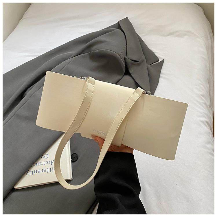 

Fashion temperament underarm bag women s 2025 new high-end simple baguette bag French light luxury commuter shoulder bag белый