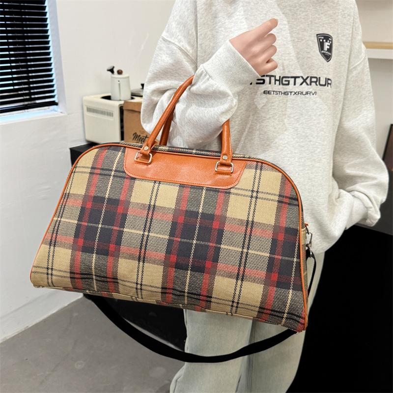 Simple casual nostalgic large-capacity outdoor handbag household seasonal clothing storage luggage