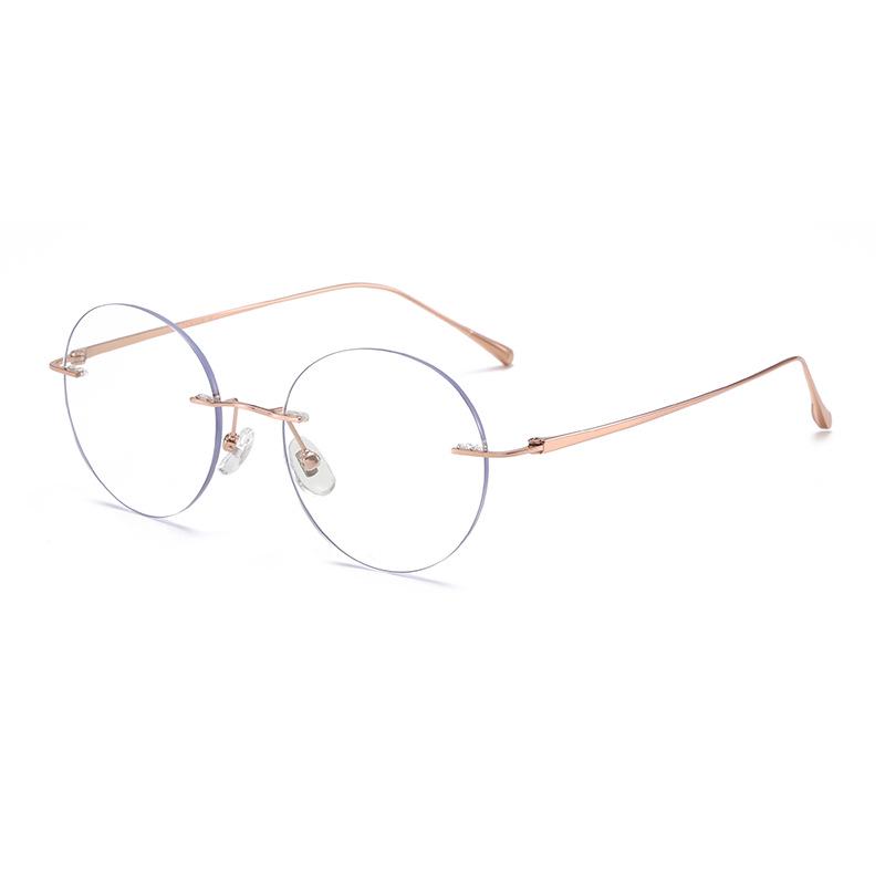 

Retro Small Round Titanium Rimless Glasses for Women – Style 9033 – Gentle, Bare-Face Design, Lens Fitting Available