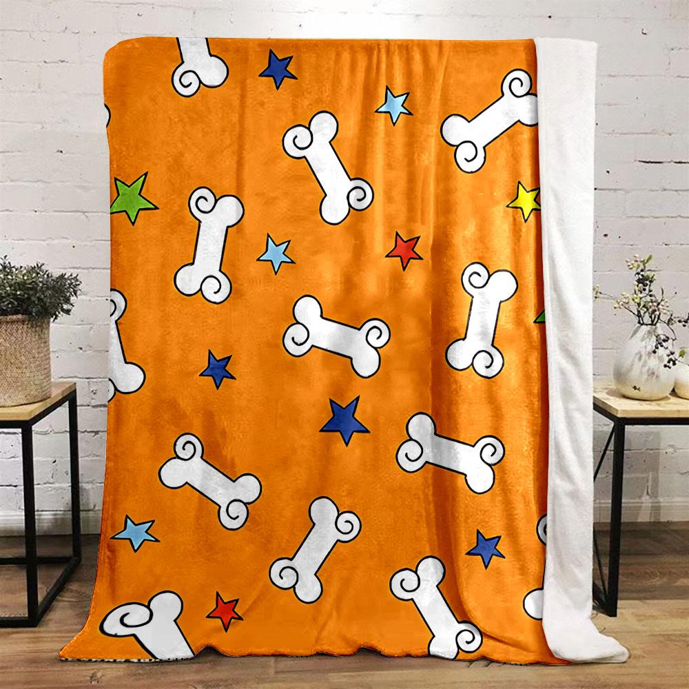 Cartoon Bones and Stars on Orange Patterned flannel blanket perfect for the bedroom living room, sofa, or a little nap