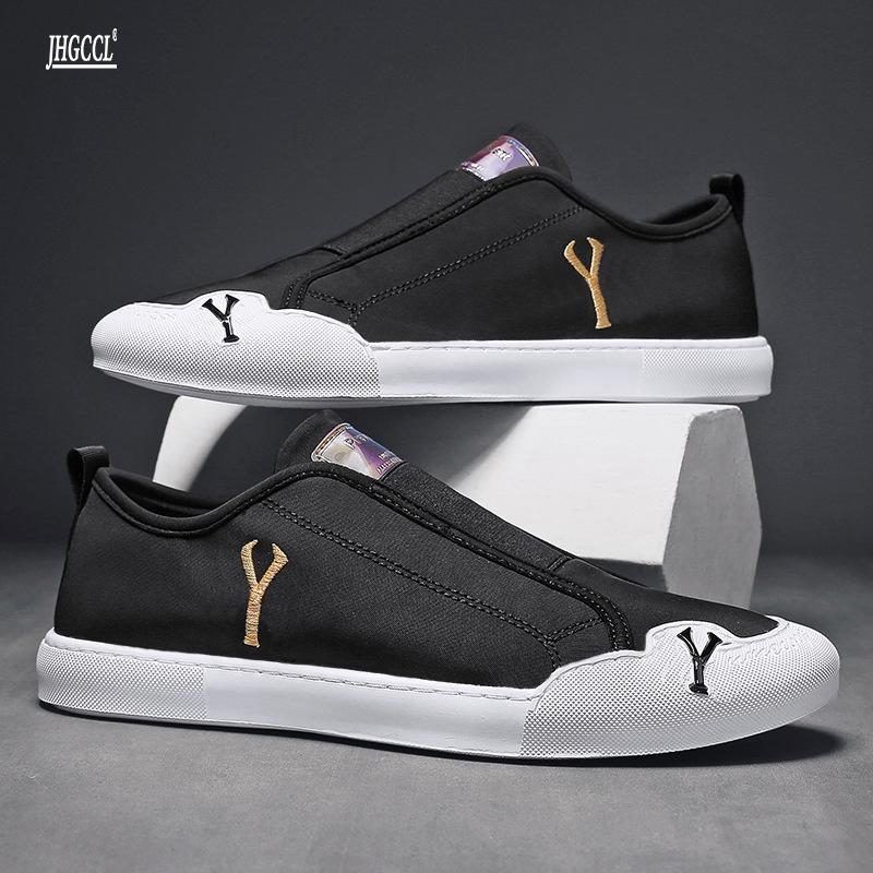 

New small white shoes men s casual board shoes spring and summer breathable simple lazy slip-on cloth shoes A15 44 чёрный