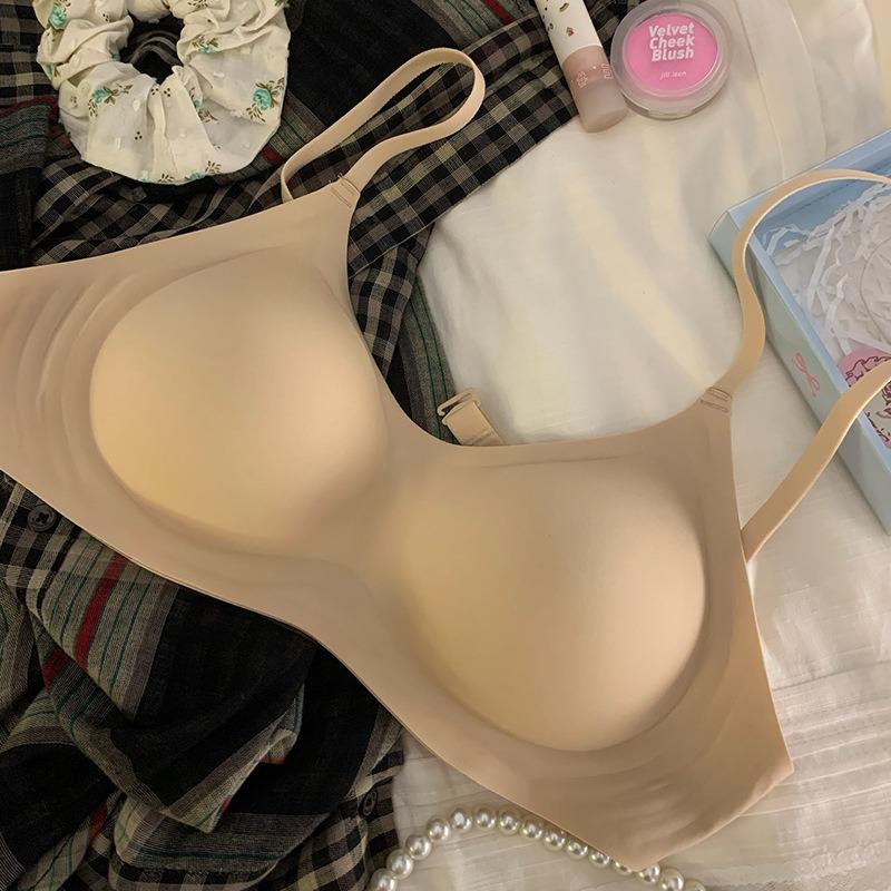 

Женское толстое бесследное собирающее маленькую грудь показывающее большую круглую без косточек U-образное нижнее белье 38/85AB телесный