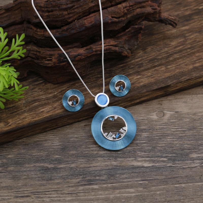 New enamel color hollow round stud earrings pendant set women's fashion high sense hollow ring necklace