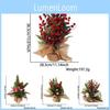 Delightful Faux Snowy Christmas Tree Centerpiece With Decorative Pinecones And Red Berries Ideal For Festive Table Arrangements