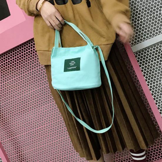 Einfarbige, lässige Damen-Segeltuch-Umhängetasche im Freien