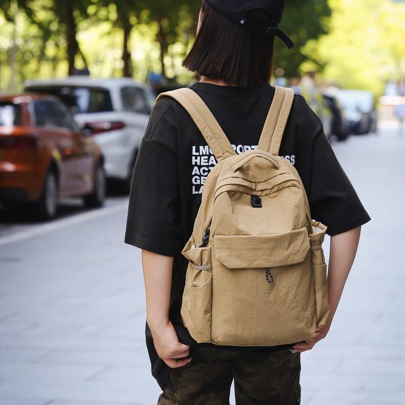 Schoolbag Japanese ins solid color backpack men's and women's large-capacity schoolbag simple and lightweight waterproof versatile casual backpack