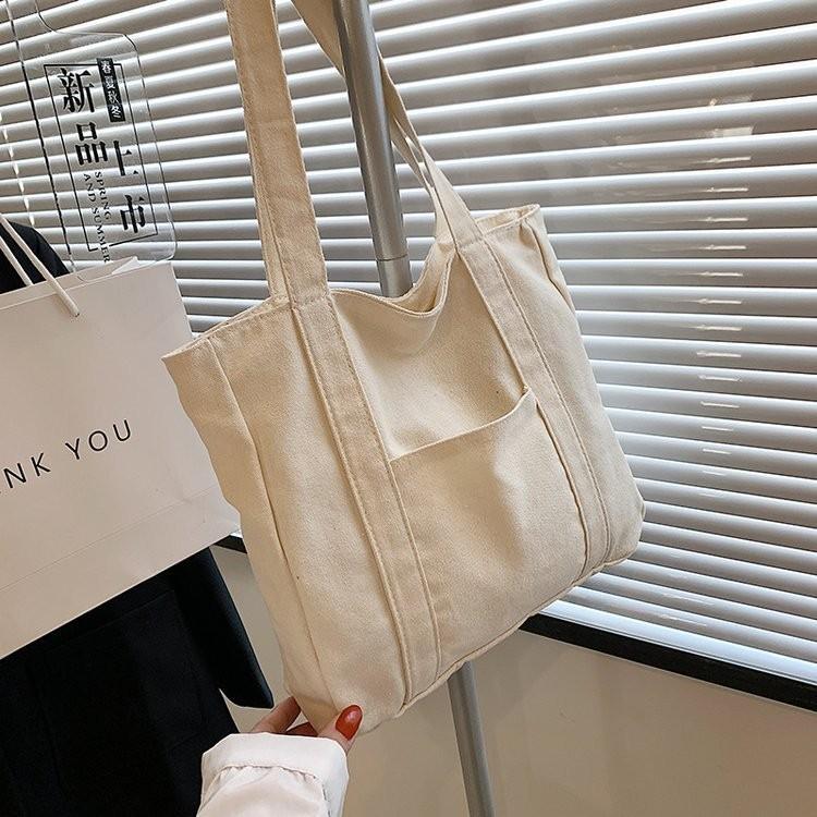 

Trendy Street Style 2023 New Canvas Shoulder Bag For Students With Large Capacity слонова кістка