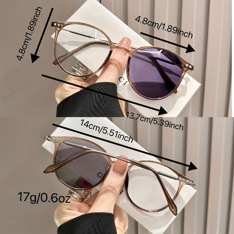 A Pair of Stylish Pochromic Glasses for Women Featuring A Vintage Semi Metal Frame Classic Minimalist Design