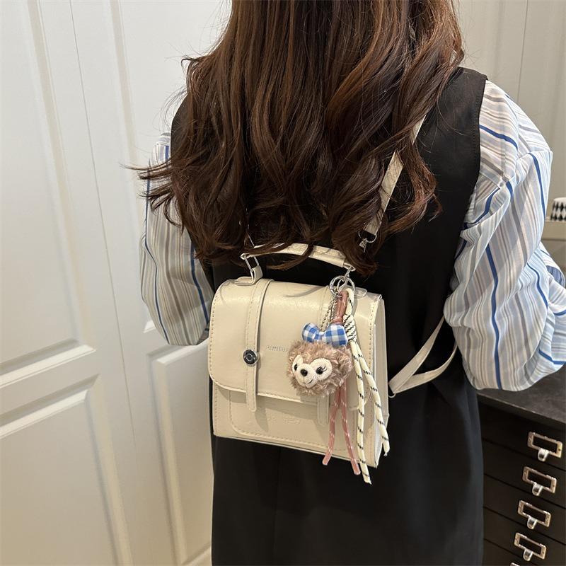 Neue süße einfache vielseitige Textur Nische Pendler College-Stil Damen Tasche Rucksack