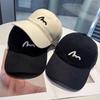 Embroidered baseball cap, lightweight and breathable for outdoor activities, designed to enhance facial features with a simple and stylish look