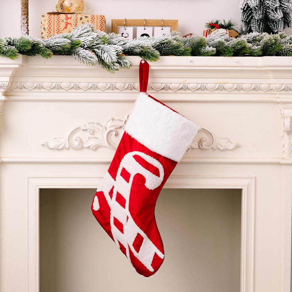 Christmas Beautifully Crafted Stockings With Soft Fabric And Playful Reindeer And Snowflake Themes