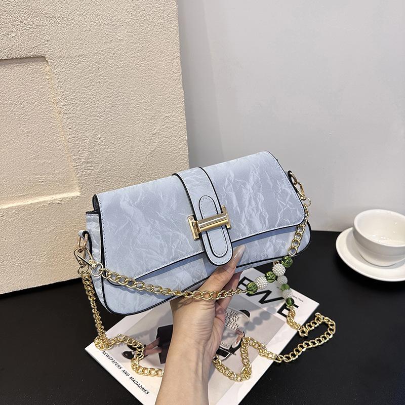 

Французская нишевая дизайнерская сумка женская 2025 новая популярная универсальная сумка-мессенджер высококлассная на одно плечо под мышку сумка-багет синий