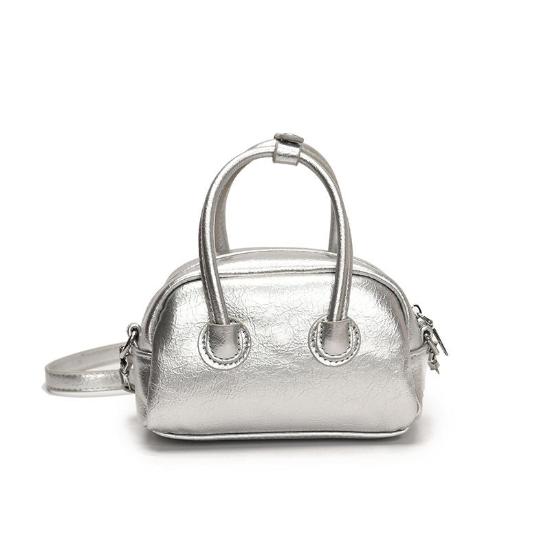 New product simple style niche solid color portable Boston bag commuting versatile casual texture messenger women's bag