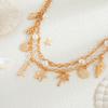 Mehrlagige Seestern Muschel Taillenkette Trendige Imitationsperle Sexy Bikini Goldfarbene Bauchkette für Frauen Mädchen Körperschmuck Geschenke