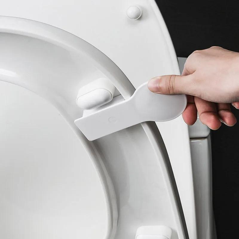 Schmutzabweisender Toilettendeckelheber Badezimmer Toilettendeckelgriff Selbstklebender Toilettensitzdeckelhalter Badezimmerzubehör