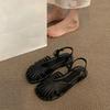 Mori baotou sandals female 2025 summer new fairy wind woven Roman shoes hollow flat bottom pig cage beach shoes