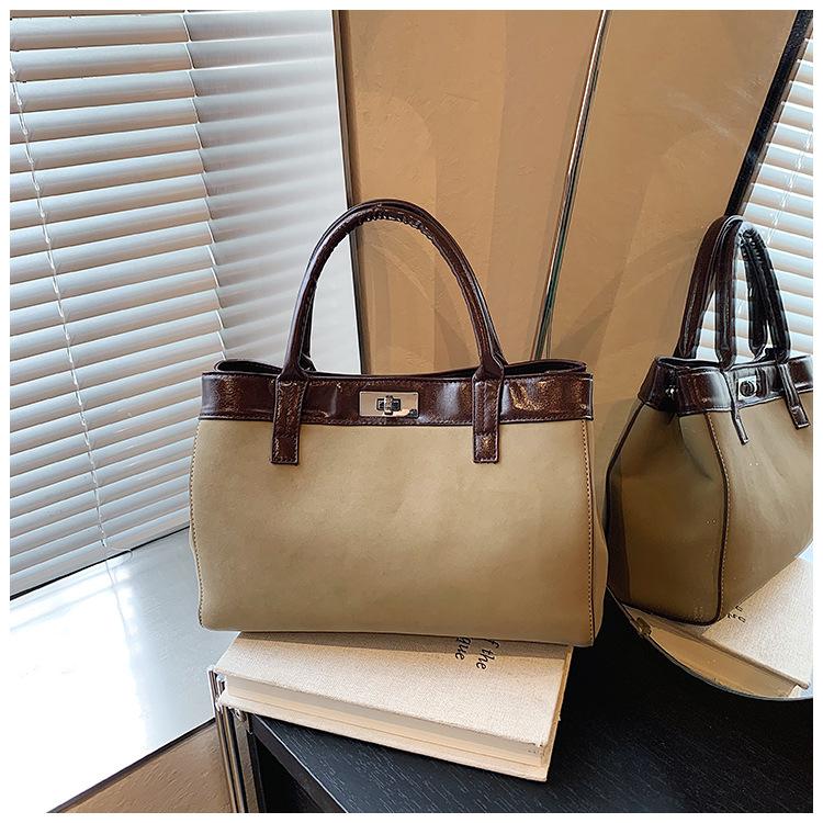 

European and American fashion simple handbag bag women s 2025 new foreign style contrasting color commuter bag high value trend messenger bag
