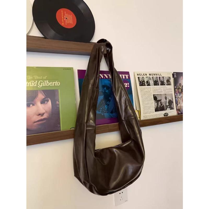 

Niche oil wax skin dumpling bag new retro commuter travel shoulder crossbody large capacity soft leather bag women s bag