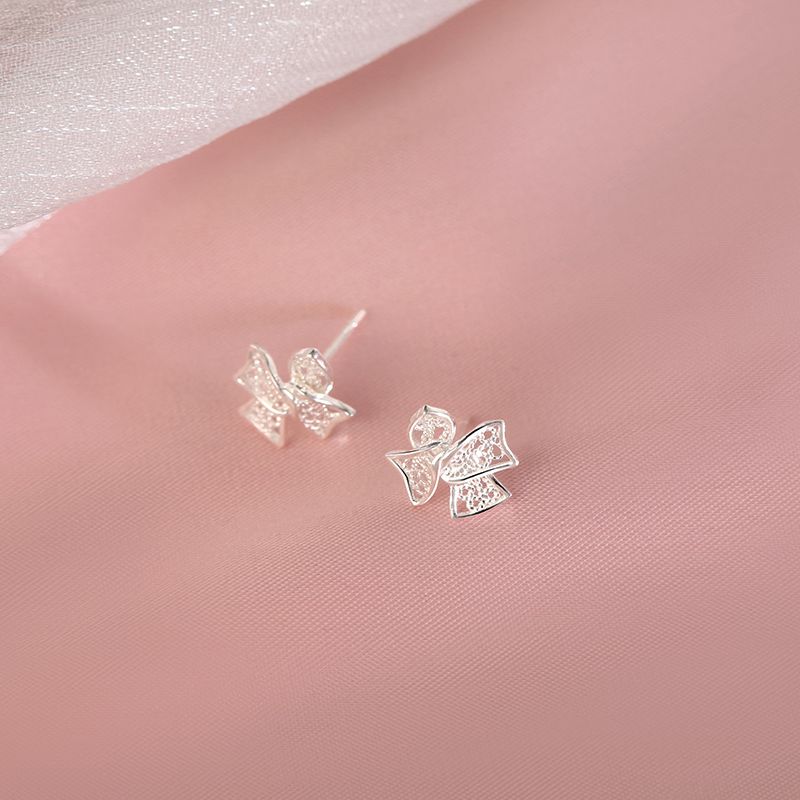 

Yanda 999 Sterling Silver Cut Out Bow Stud Earrings Female 2025 New Arrival Western Style Ear Bone Stud Screw Tightening Buckle Ear Rings Bows earring-regular earpin