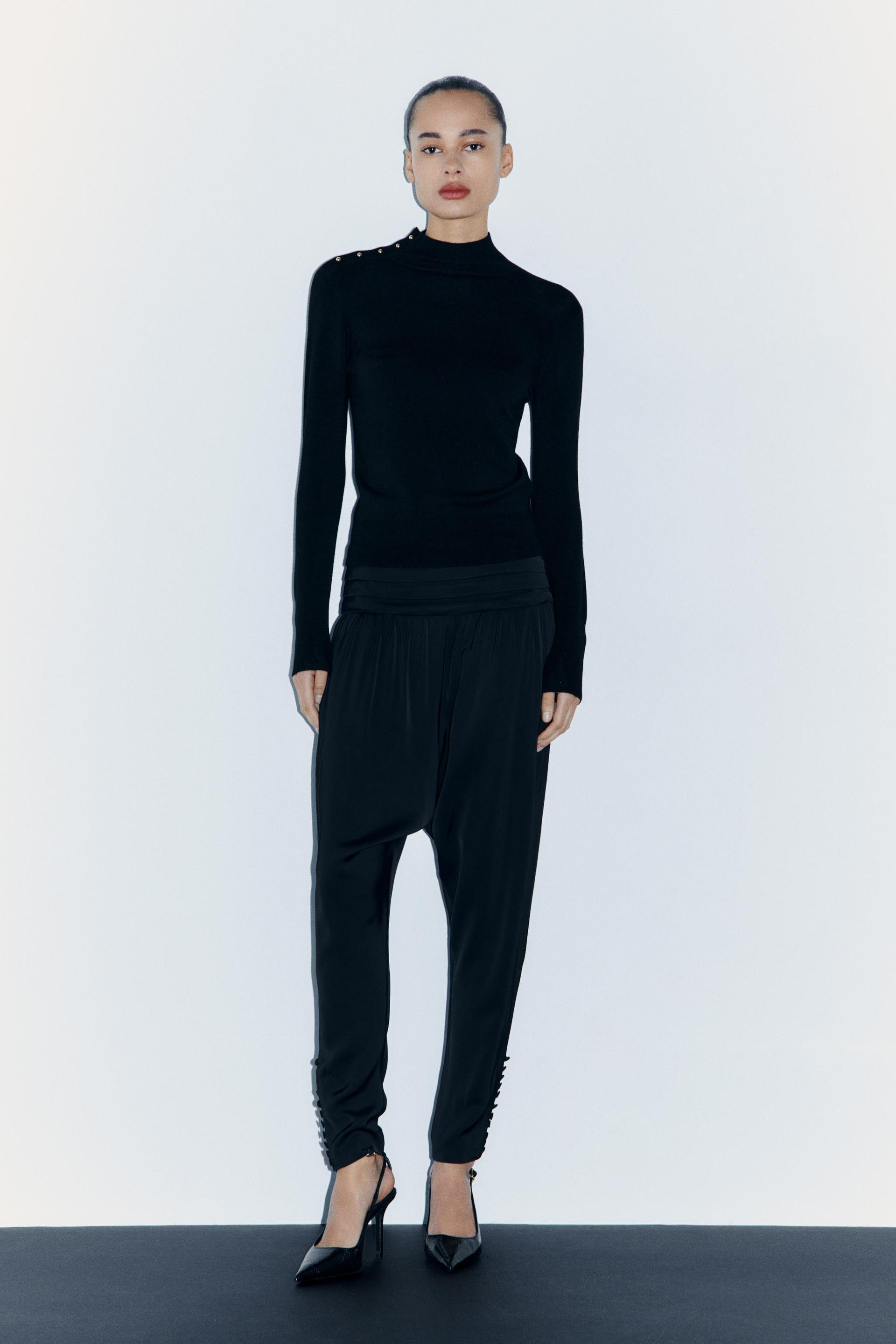 

ТРИКОТАЖНЫЙ СВИТЕР НА ПУГОВИЦАХ