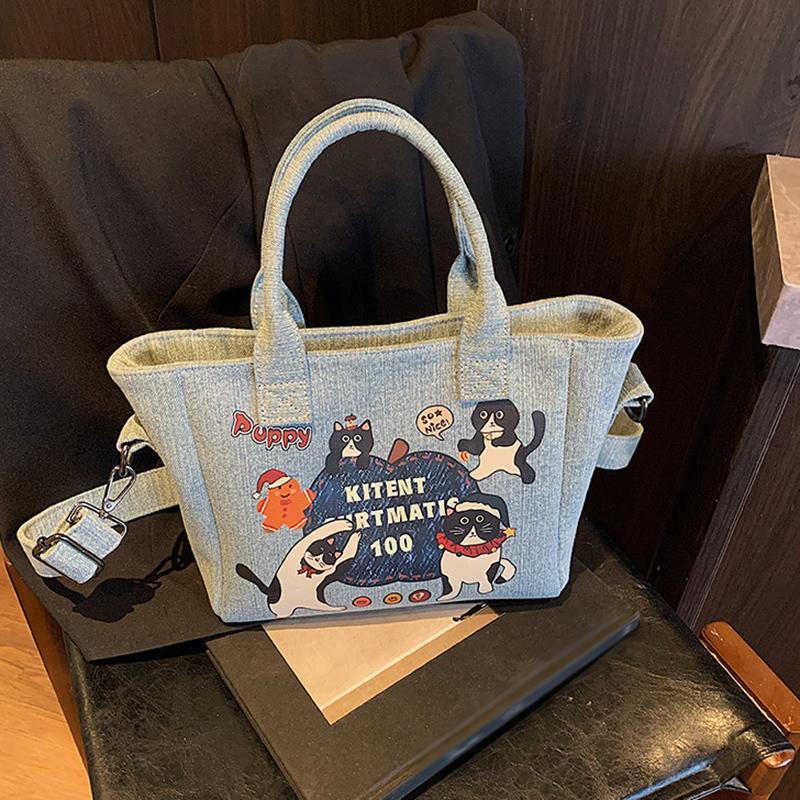 2025 New Trendy Cartoon Cat Print Denim Bucket Bag Versatile Casual Commuter Large Capacity Crossbody Shoulder Bag for Women