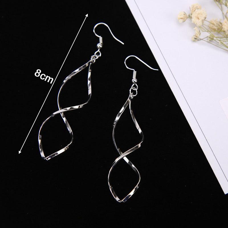 New Spiral Women's Hook Earrings Hollow Twist Geometric Statement Long Hanging Earrings Wraped Oval Metal Pendants Earrings