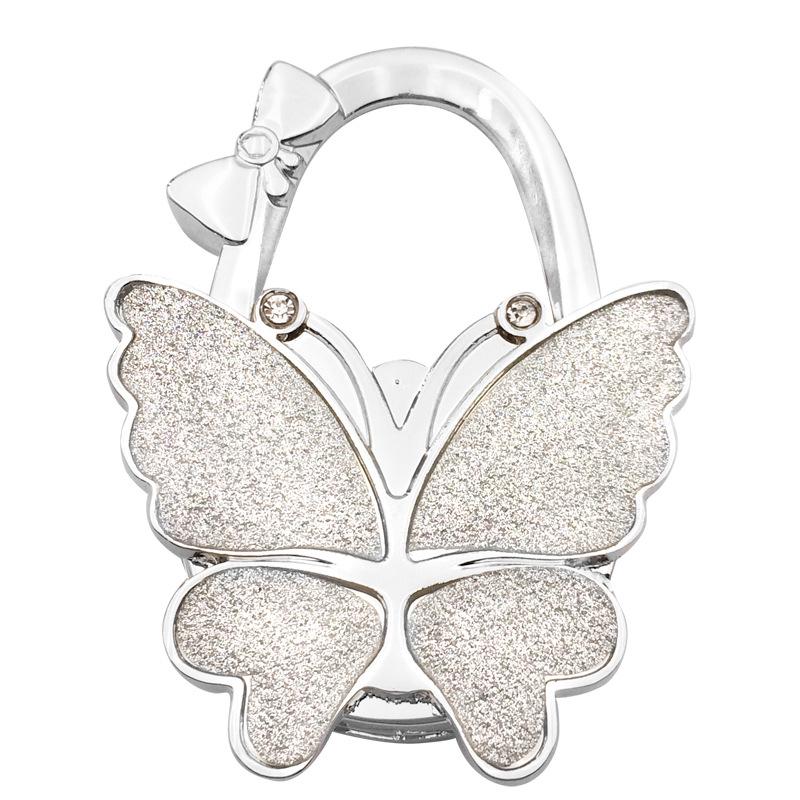 Large Matte Butterfly Hanging Bag Hook - Foldable Women's Bag Buckle & Portable Table Edge Hook for Luggage Accessories.