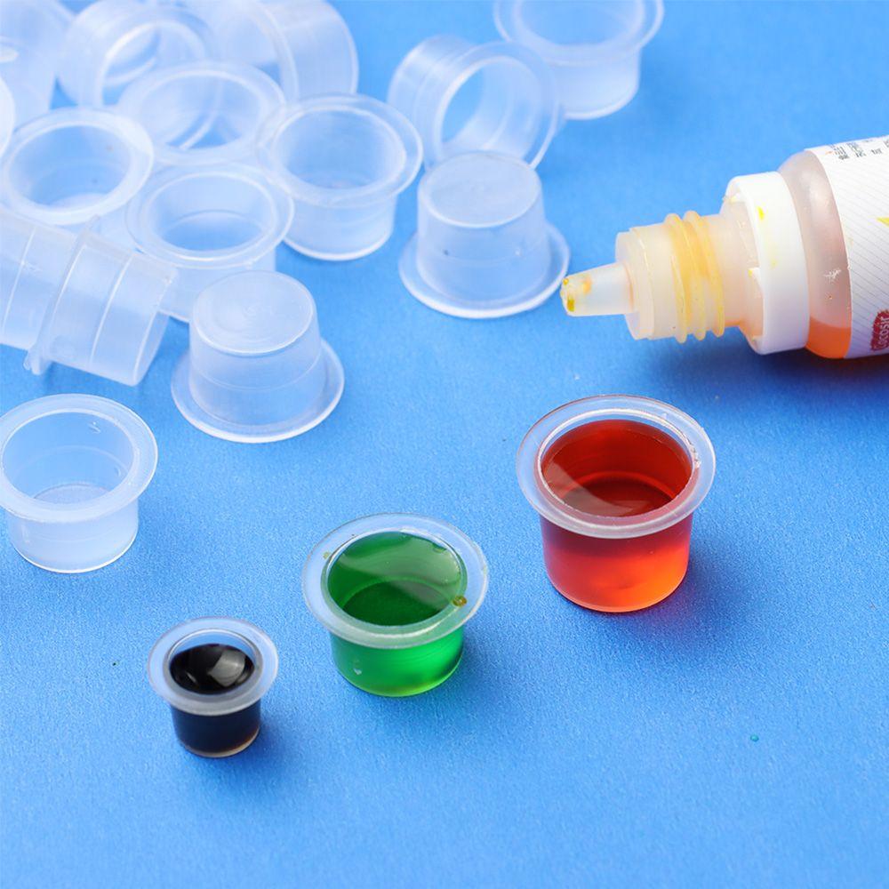 100 sztuk kubeczków na tusz do tatuażu Jednorazowe plastikowe kubeczki Kubeczki na pigmenty do body artu Pojemnik Stojak Akcesoria do makijażu i tatuażu L/M/S