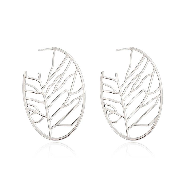 

Hot-selling jewelry, retro ethnic style hollow leaf earrings, simple gold ins wind stud earrings. срібний