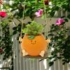 Creative Multifunctional Orange Swing Planter Pot With Swing Feature Suitable for Kids Entertainment and Home Gardening