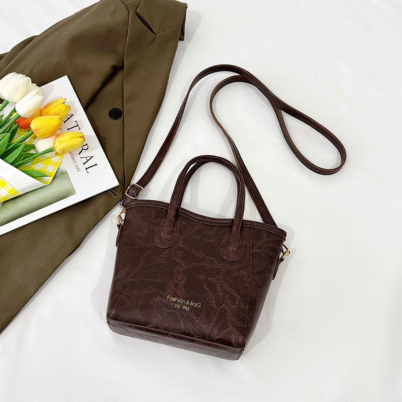 

Премиальный универсальный портативный мешок-ведро, новая трендовая текстура, повседневная наплечная сумка-мессенджер, нишевый дизайн, женская сумка