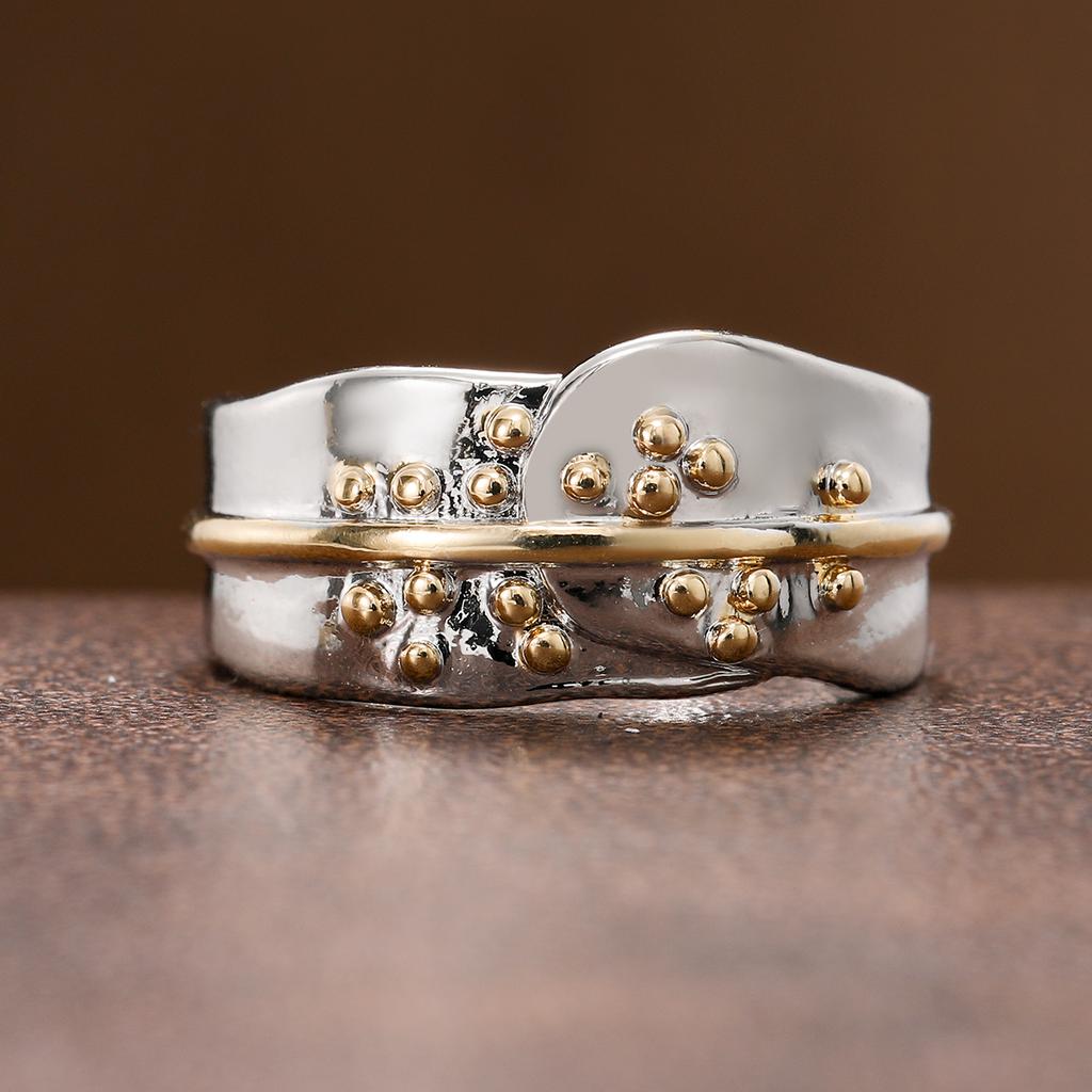 geometric double-color ring in copper material for ladies' jewelry. Suitable for formal events or daily wear.