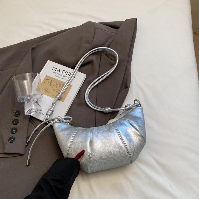 

Нишевая дизайнерская сумка женская 2025 лето новая мода на плечо кроссбоди сумка-круассан высококлассная подмышечная сумка-пельмень серебряный