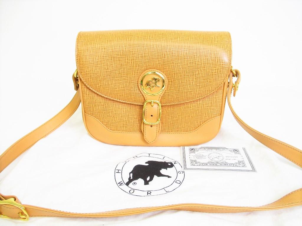 

Коричнева шкіряна сумка через плече Authentic HUNTING WORLD №8604 відремонтована