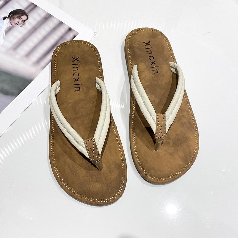 Flip-Flops Damenmode Oberbekleidung 2025 Sommer coole Hausschuhe Koreanische Version von Studenten schlichte rutschfeste Zehensteg-Strand-Sandalen