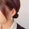 S925 Silver Needle Korean Fashion Heart Pearl Earrings - Elegant, Versatile Jewelry for Women.