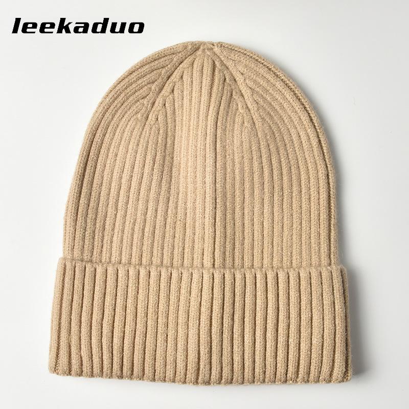 Simple solid color hat Men's winter light board cover Knitted hat Wool hat Autumn and winter warm ear protector Cold hat