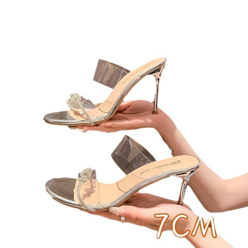 The Korean version of this summer's new large-size cool slippers, rhinestone kinks, transparent high-heeled sandals, and women's shoes with one word.