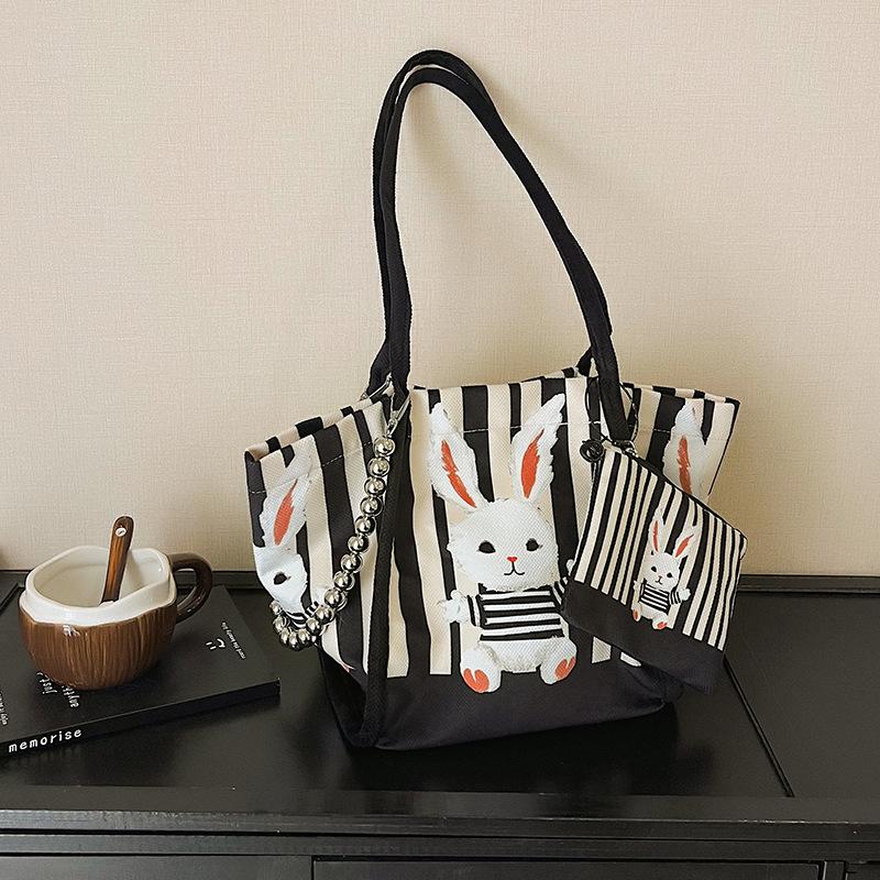 

2025 new striped canvas bag cute rabbit shoulder bag niche trendy child and mother tote bag large capacity messenger bag 23*23*20 чорний