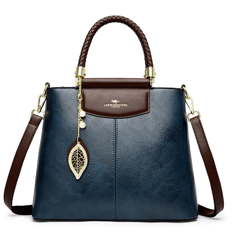 

Women s bag portable gift mother practical women s shoulder bag large capacity messenger bag bag синій