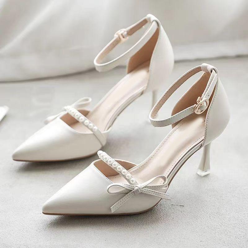 French bow bag head sandals women's summer new one-word with hollow high heels women's thin heel pointed single shoes