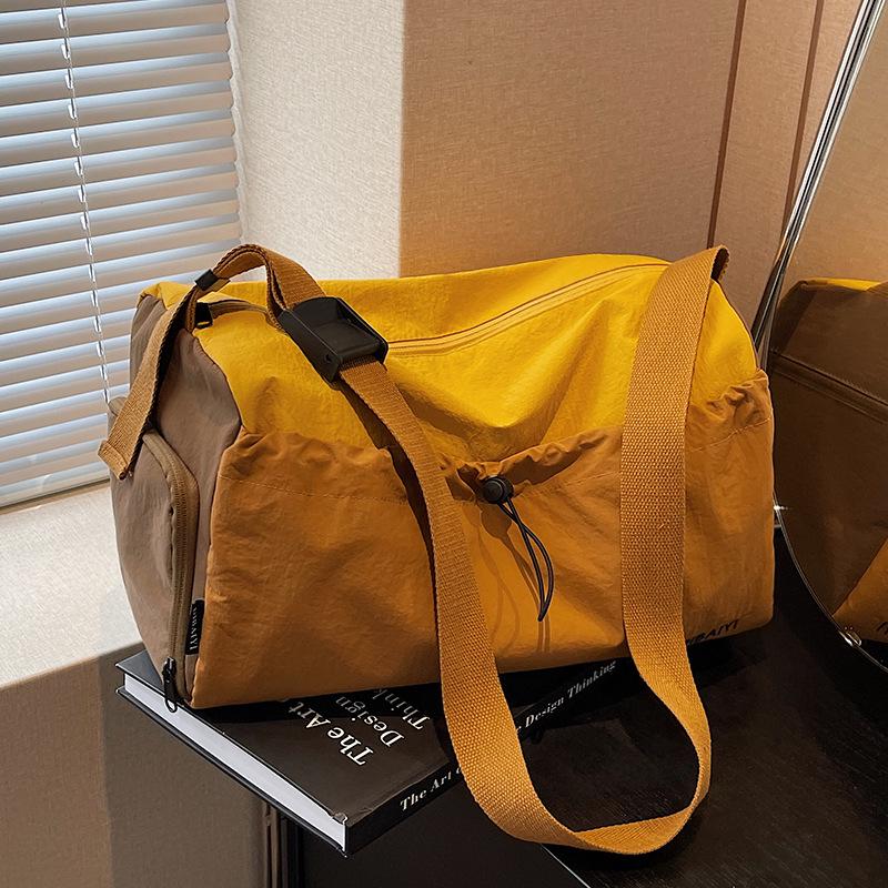 Women's Lightweight Sports and Travel Bag - Durable, Spacious, Wet/Dry Separation, Ideal for Fitness and Short Trips.