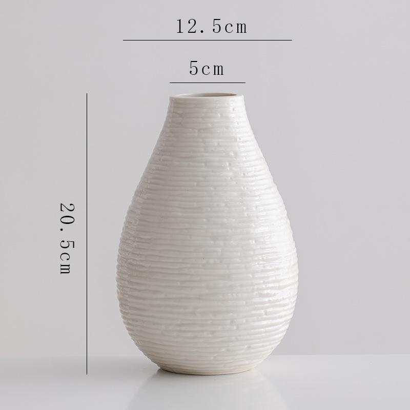 Weiße minimalistische Keramik-Dekorationsvase mit frischen Blumen Wohnzimmer Eingang Schreibtisch Blumenarrangement Dekoration Vasen