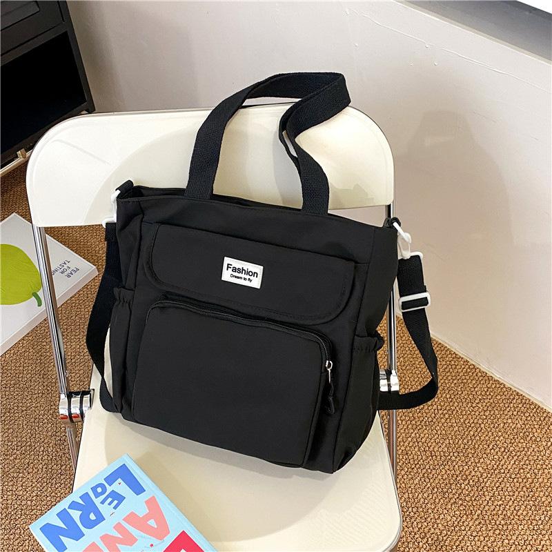 

Ученики средней школы Ученики старшей школы Большая вместимость наплечная сумка Сумка через плечо Простая и свежая нейлоновая сумочка one size fits all чёрный