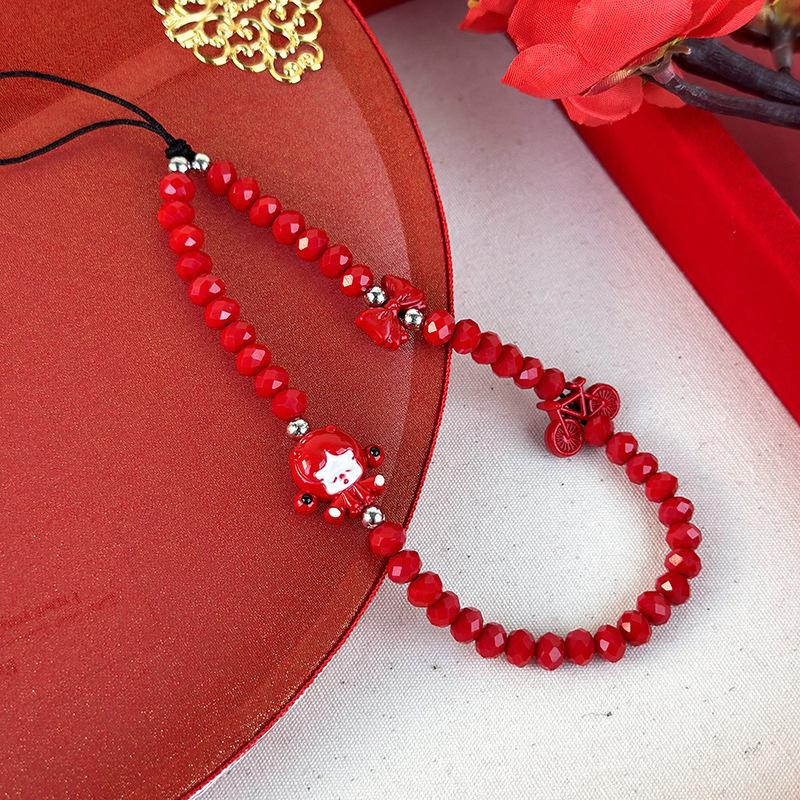 

Новорічне червоне щастя, сповнене вишуканих бісерних ланцюжків для сумок для мобільних телефонів, жіночих аксесуарів