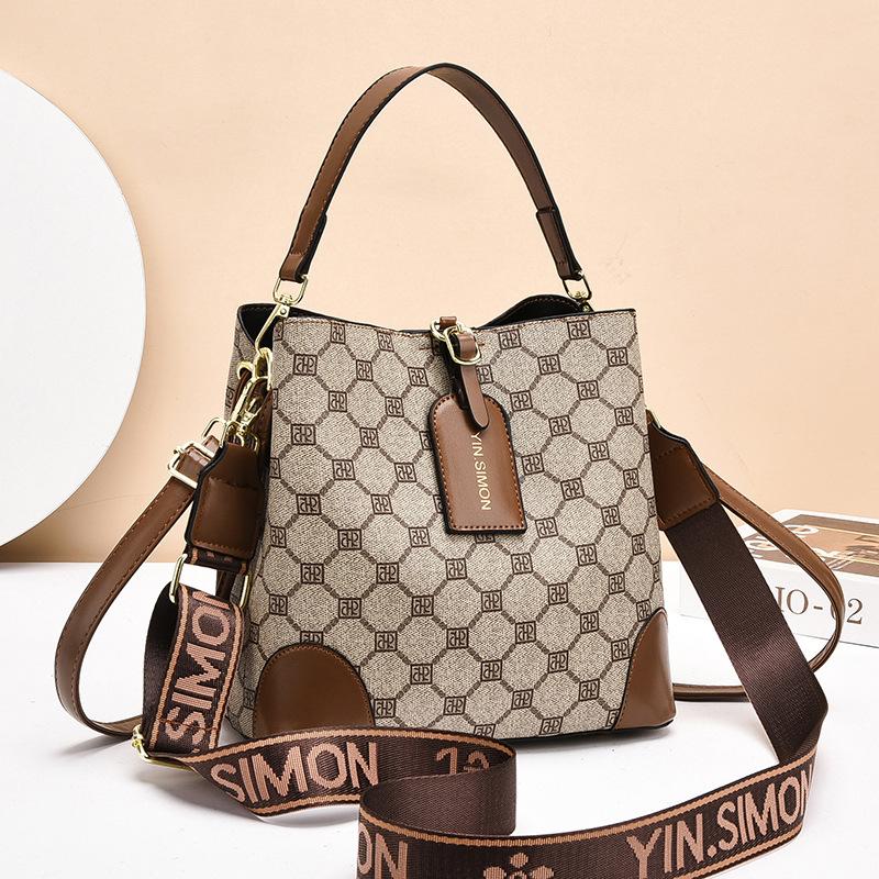 

Женская сумка из ПУ 2025 новая сумка-ведро нишевая женская сумка на плечо сумка-мессенджер большая вместимость женская сумка