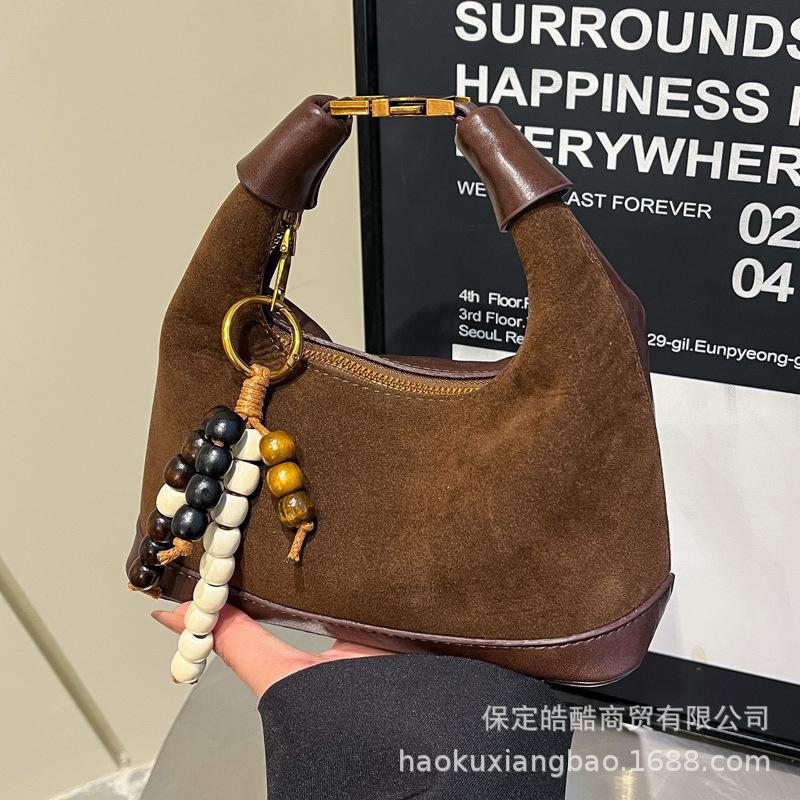 Premium sense niche bag women's autumn and winter 2025 new matte retro messenger bag casual explosion portable dumpling bag