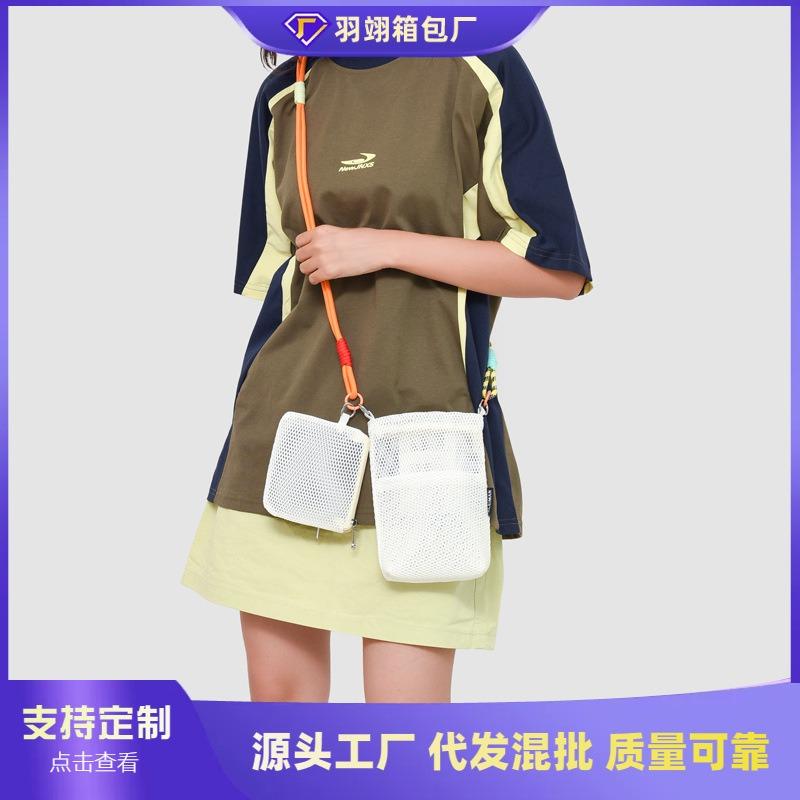 Niche hollow bag women's summer new fashion messenger bag high-end sense child and mother mobile phone bag