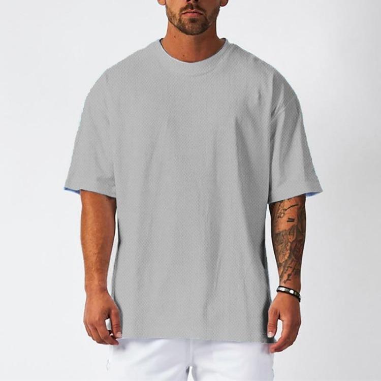 Nouvelle Marque Homme Lâche Surdimensionné Musculation Fitness Été Séchage Rapide Maille Salle de Sport Sport T-shirt d'Entraînement Couleur Unie