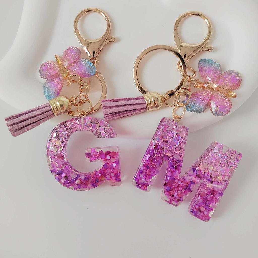 Purple Iridescent Resin Letter Keychain with Butterfly Tassel